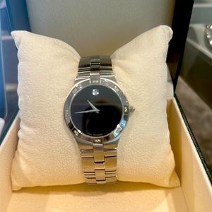 Men’s Movado watch with diamond on bezel